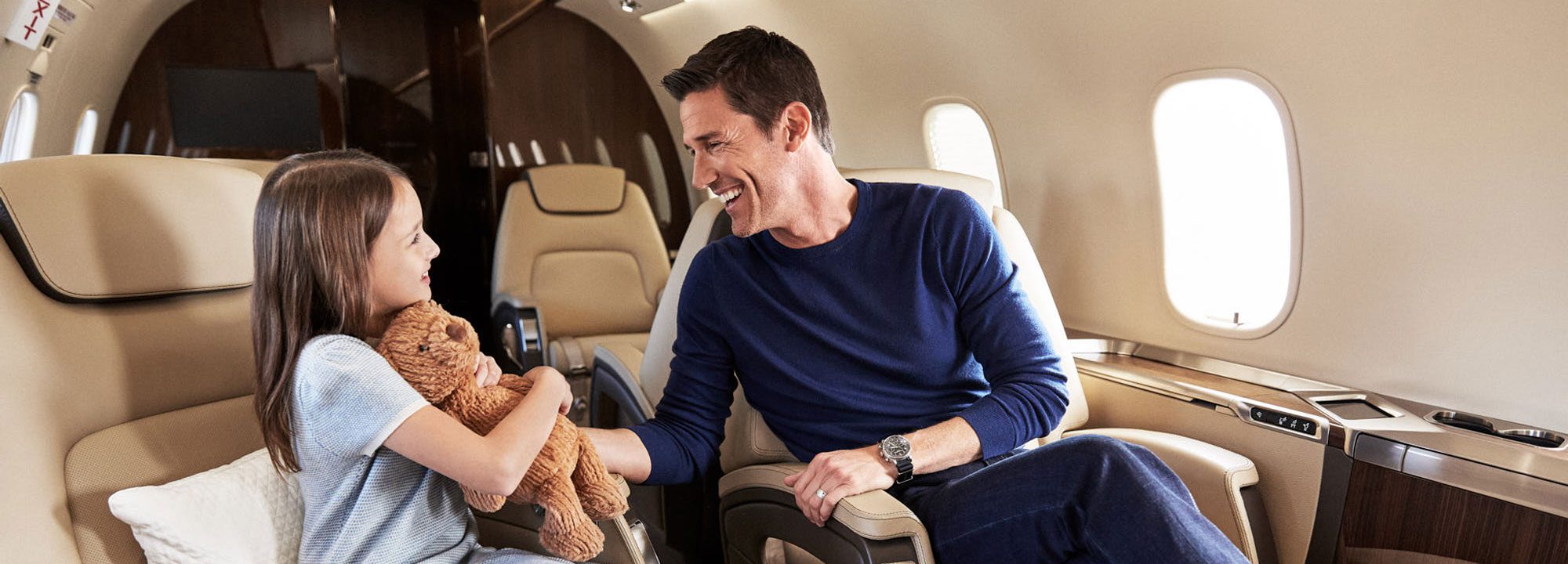 airplane-interior-people Father and daughter in SENTIENT JET